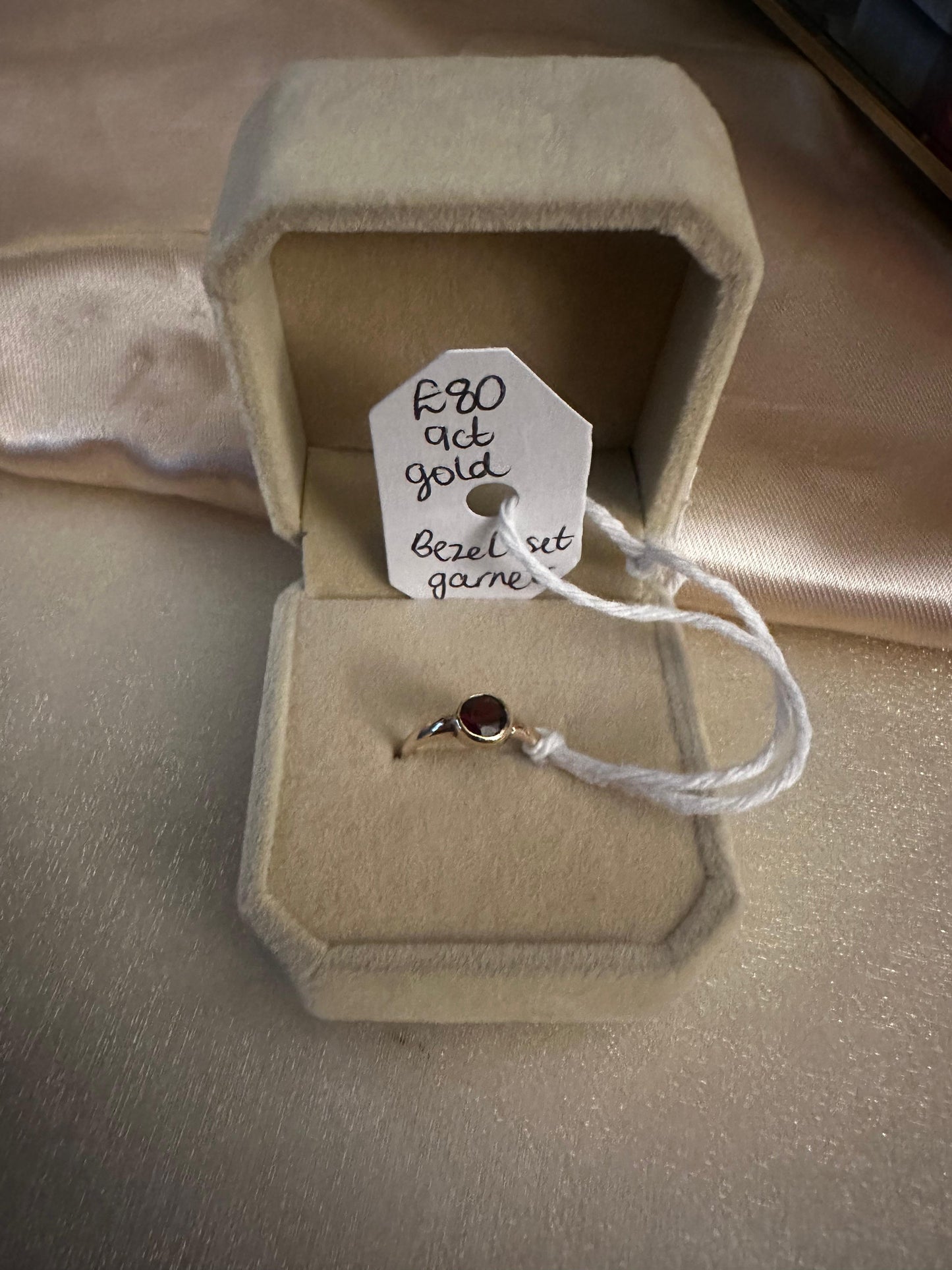 Bezel garnet solitaire