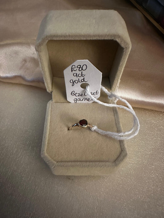 Bezel garnet solitaire